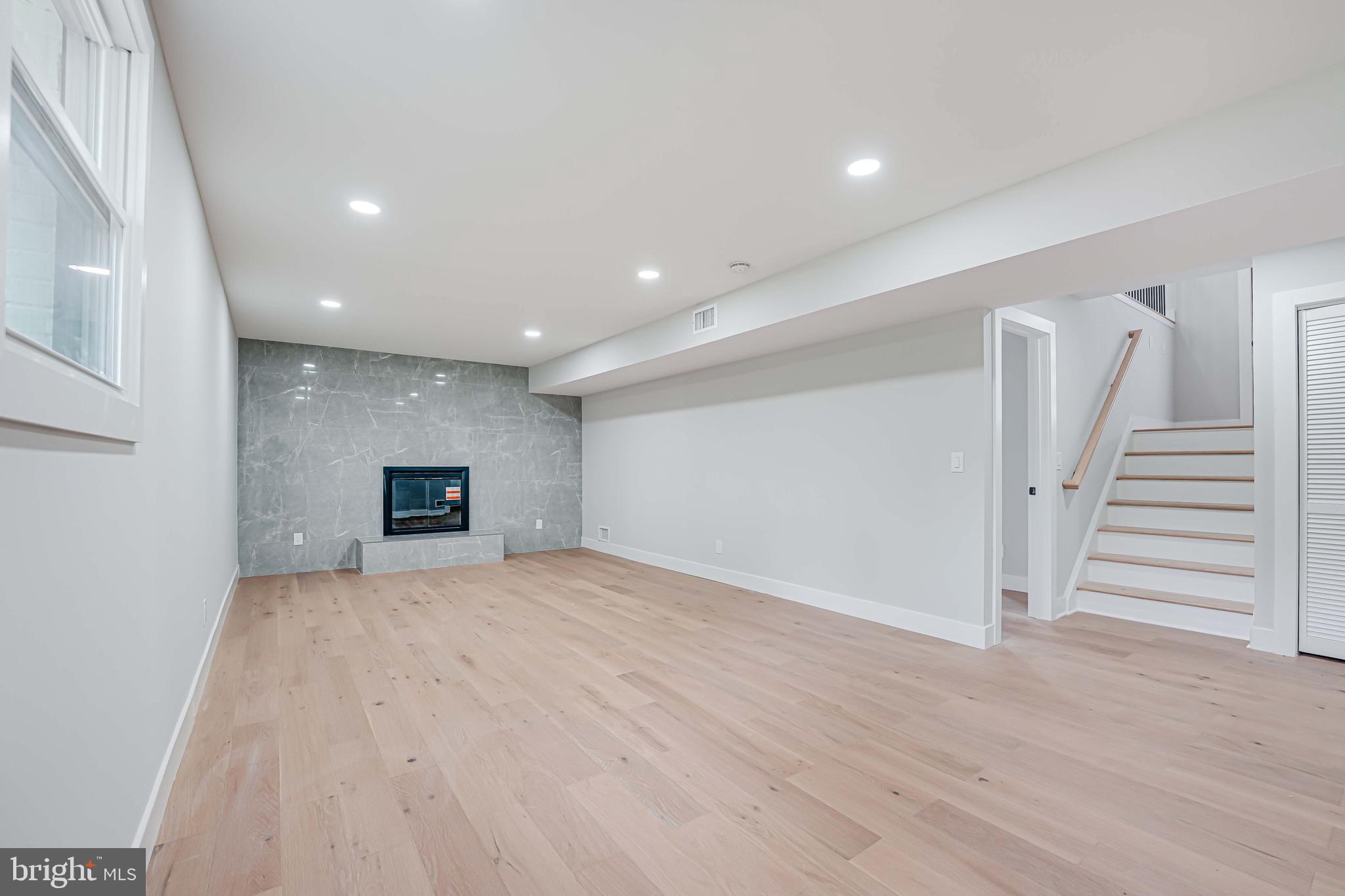 8643 Gateshead Road Alexandria, VA 22309 - Photo 28 of 40 a view of a livingroom with a staircase