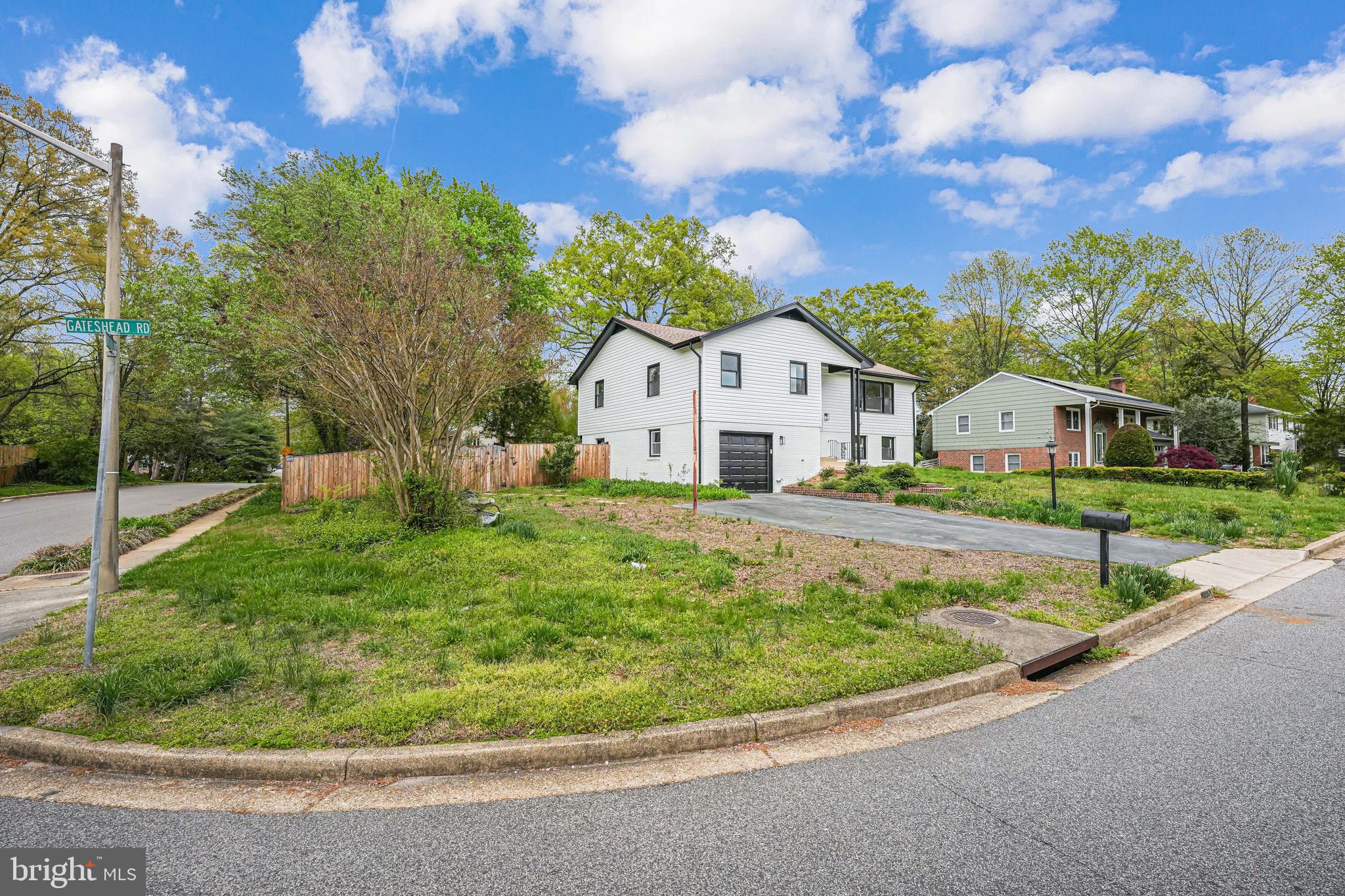 8643 Gateshead Road Alexandria, VA 22309 - Photo 34 of 40 a white house with a large pool