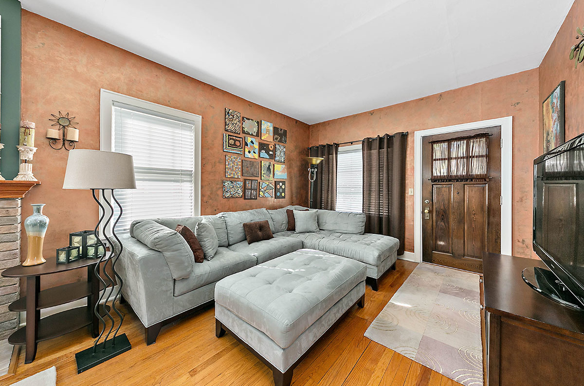 826 North Center Street Naperville, IL 60563 - Photo 2 of 21 a living room with furniture and a flat screen tv