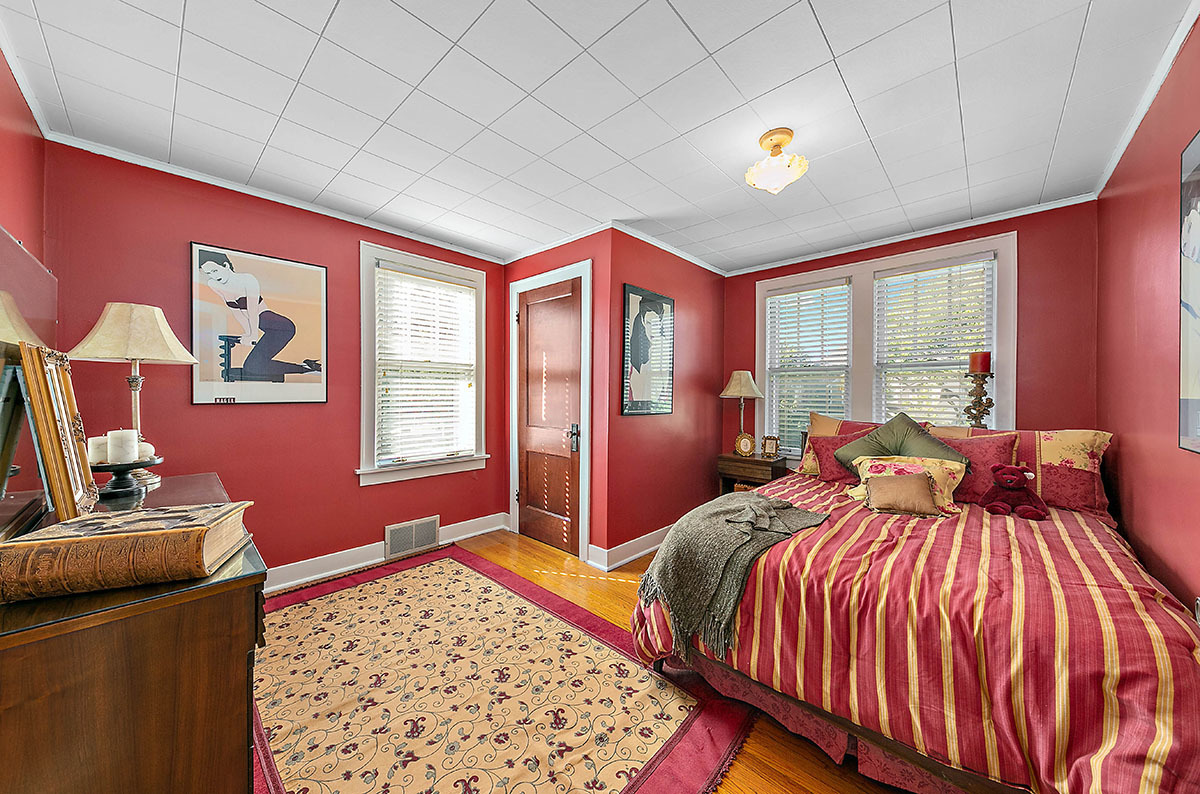 826 North Center Street Naperville, IL 60563 - Photo 11 of 21 a bedroom with a bed and a dresser next to a window