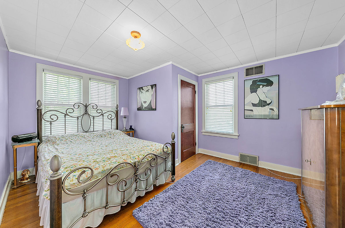 826 North Center Street Naperville, IL 60563 - Photo 12 of 21 a bedroom with a bed with wooden floor