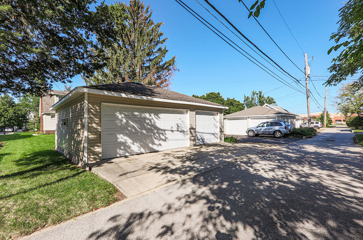 826 North Center Street Naperville, IL 60563 - Photo 20 of 21 a car parked in front of a house