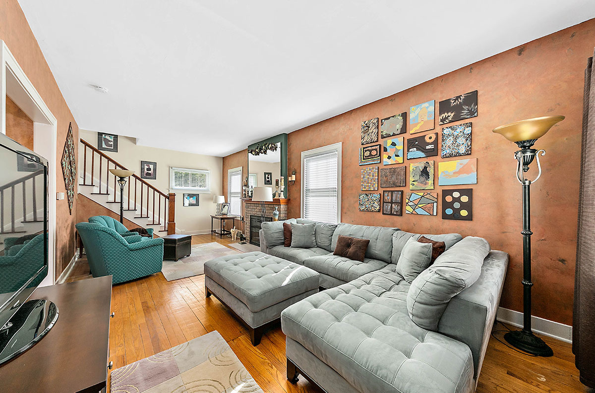 826 North Center Street Naperville, IL 60563 - Photo 5 of 21 a living room with furniture and a flat screen tv