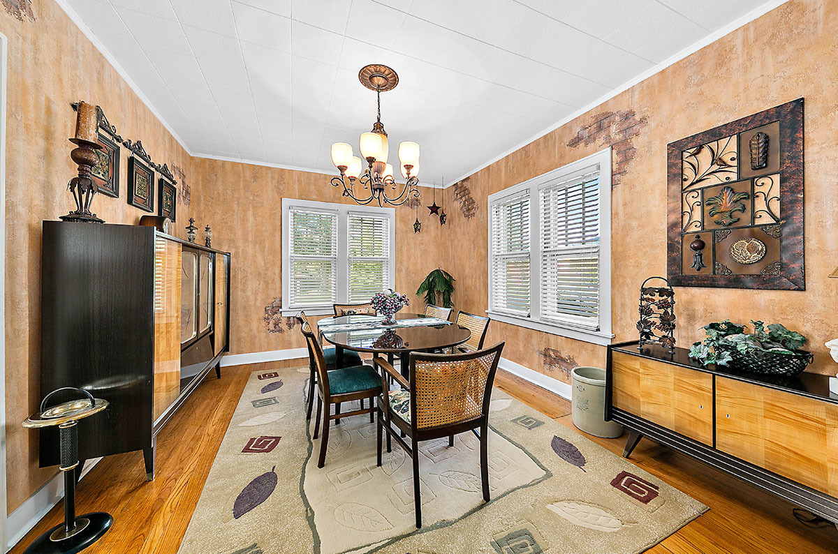 826 North Center Street Naperville, IL 60563 - Photo 7 of 21 a view of a dining room with furniture a chandelier and wooden floor