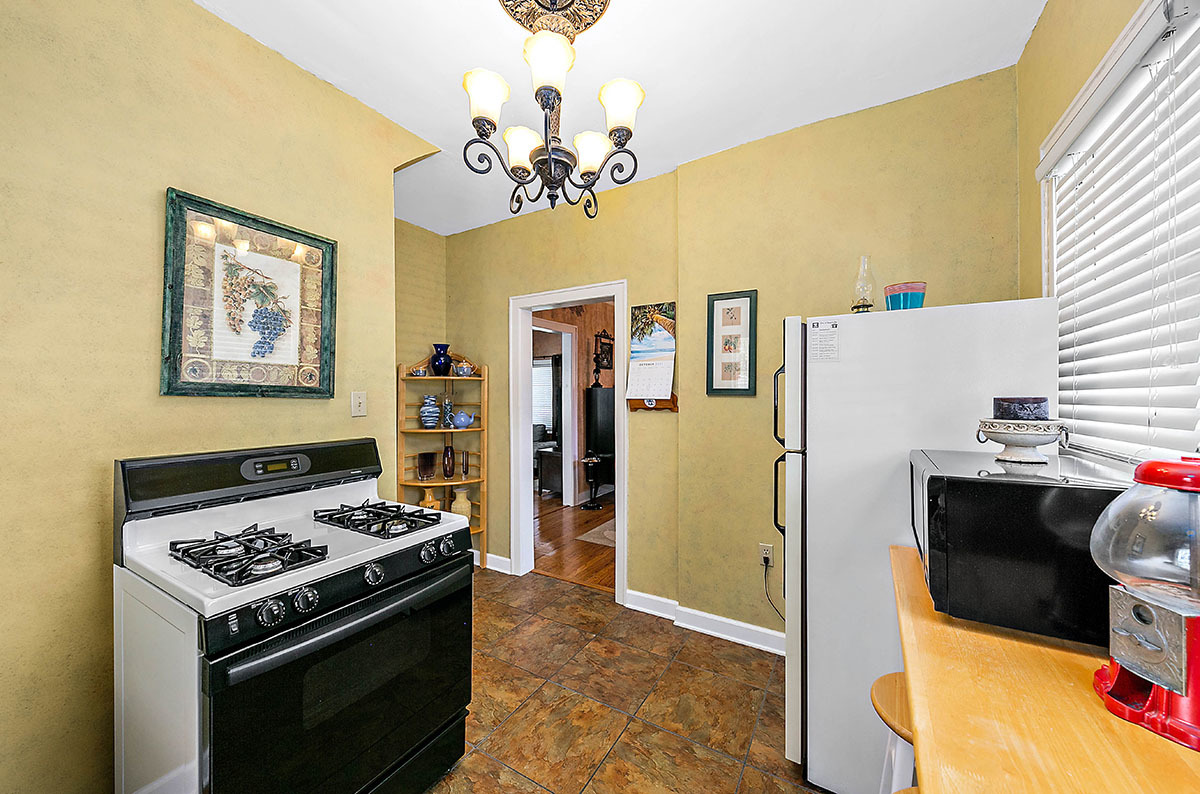 826 North Center Street Naperville, IL 60563 - Photo 10 of 21 a kitchen with a stove and refrigerator
