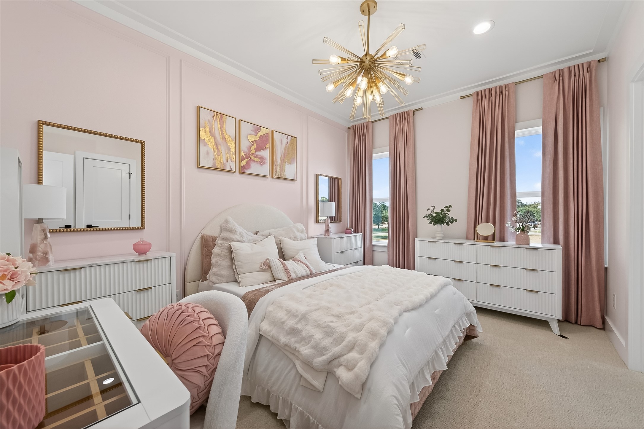 13714 New Shiloh Road Cypress, TX 77429 - Photo 10 of 14 a bedroom with a bed and a chandelier