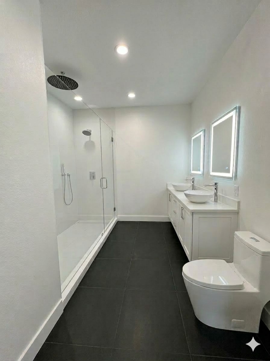 13714 New Shiloh Road Cypress, TX 77429 - Photo 11 of 14 a bathroom with a double vanity sink a toilet and shower