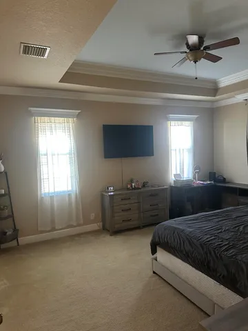 a view of a bathroom with a bathtub and a window