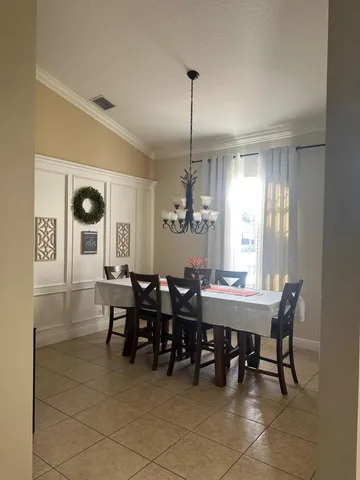 a kitchen with a sink and a stove top oven