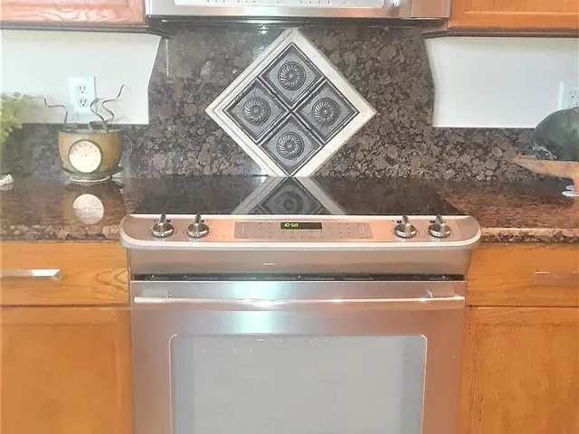 a view of a sink and dishwasher
