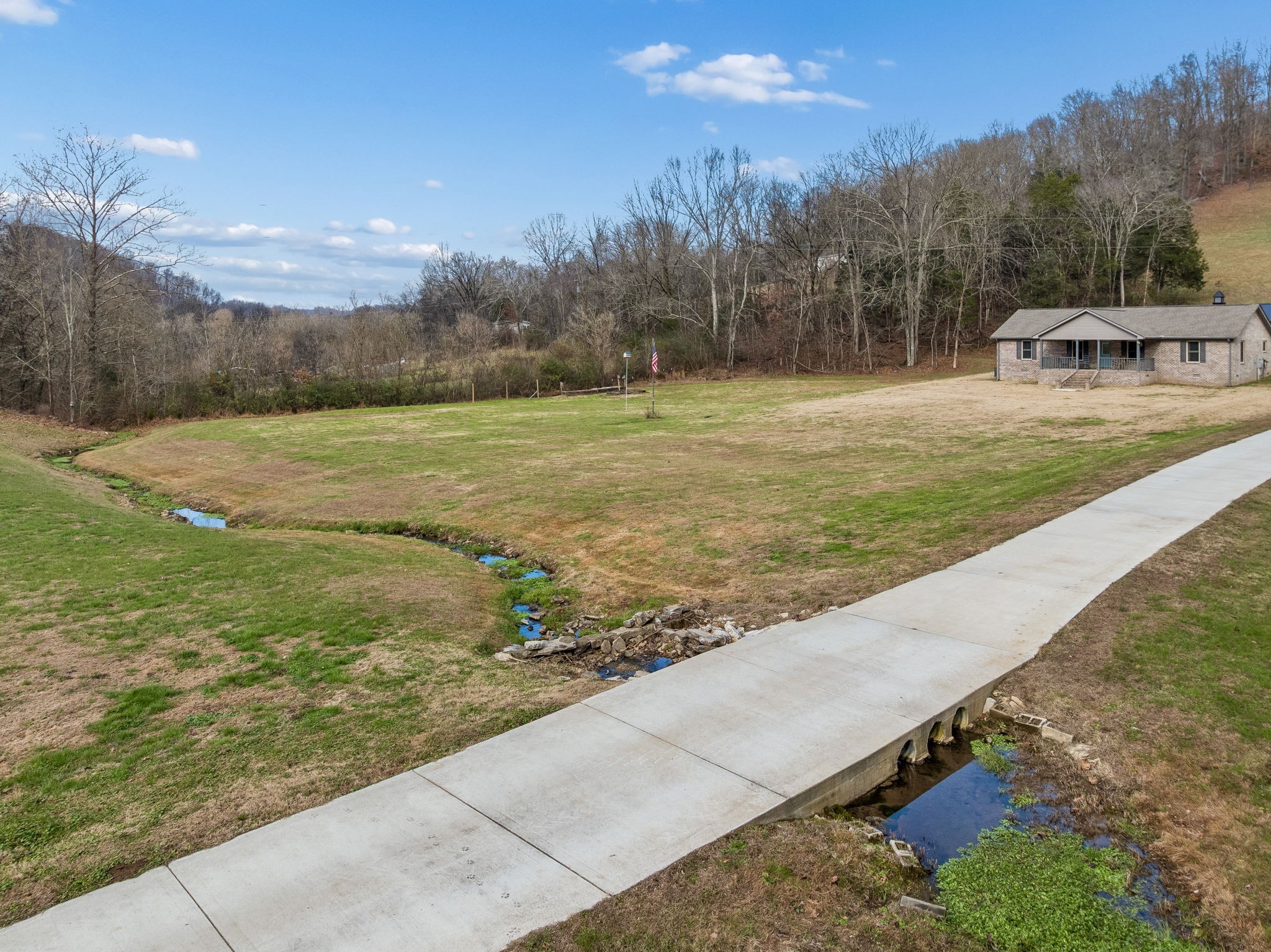 76 Cathcart Road Frankewing, TN 38459 - Photo 11 of 25 a view of a yard with a fountain