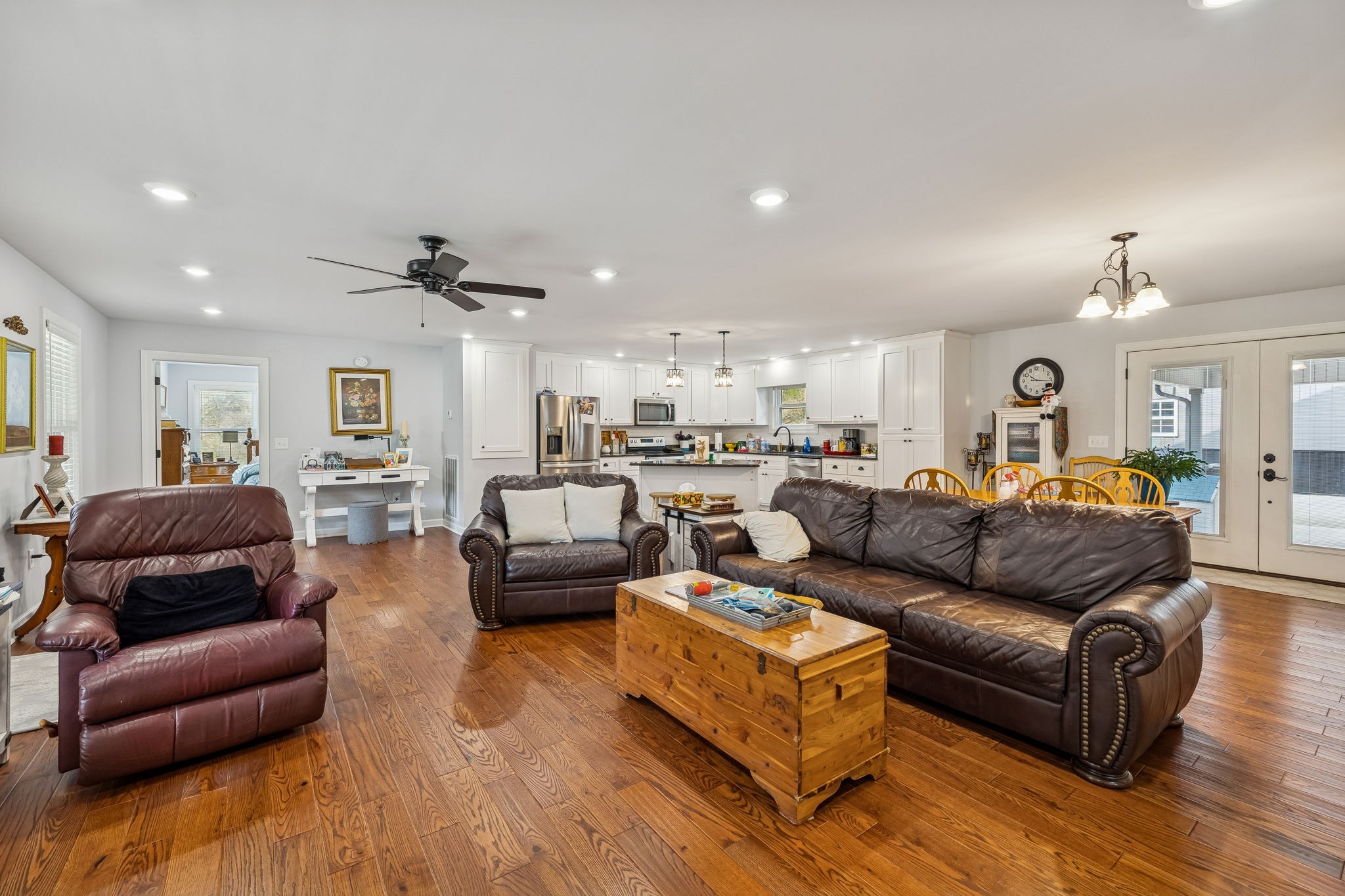76 Cathcart Road Frankewing, TN 38459 - Photo 17 of 25 a living room with furniture kitchen view and a wooden floor