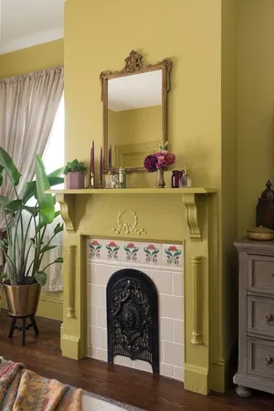 a utility room with a sink and a mirror
