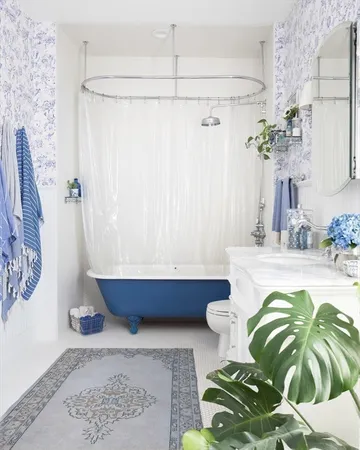 a bathroom with a bathtub and shower