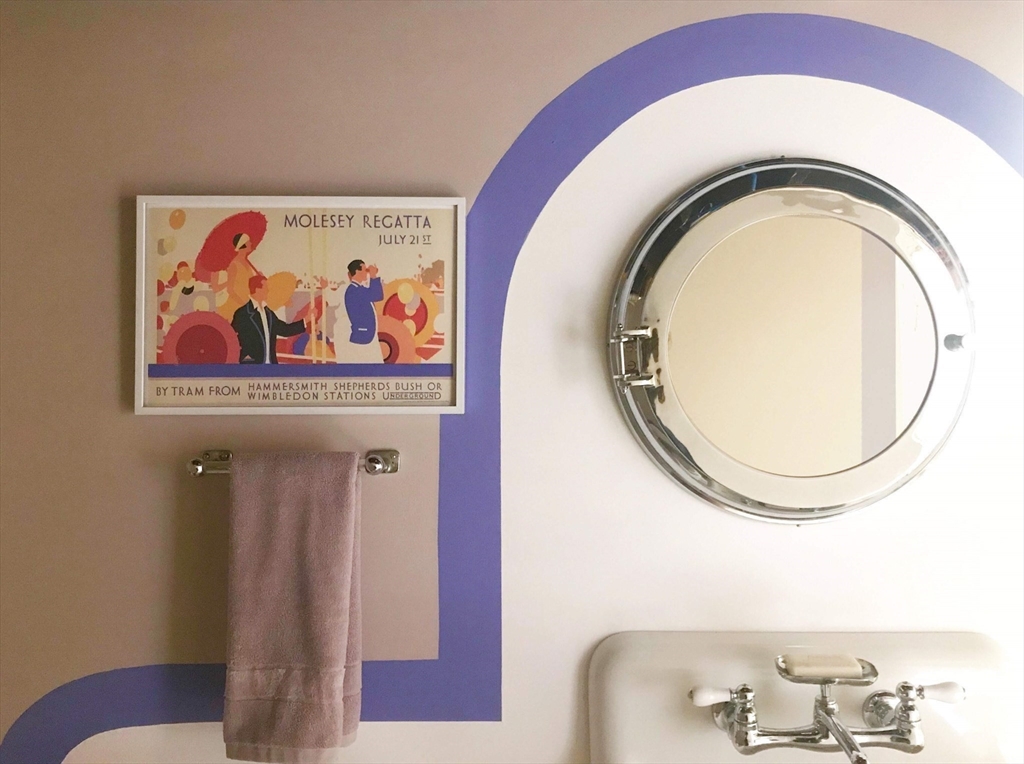 198 Byron Street Boston, MA 02128 - Photo 16 of 18 a bathroom with a toilet and a mirror