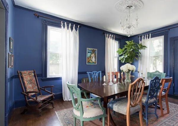 a view of a dining room with furniture window and outside view