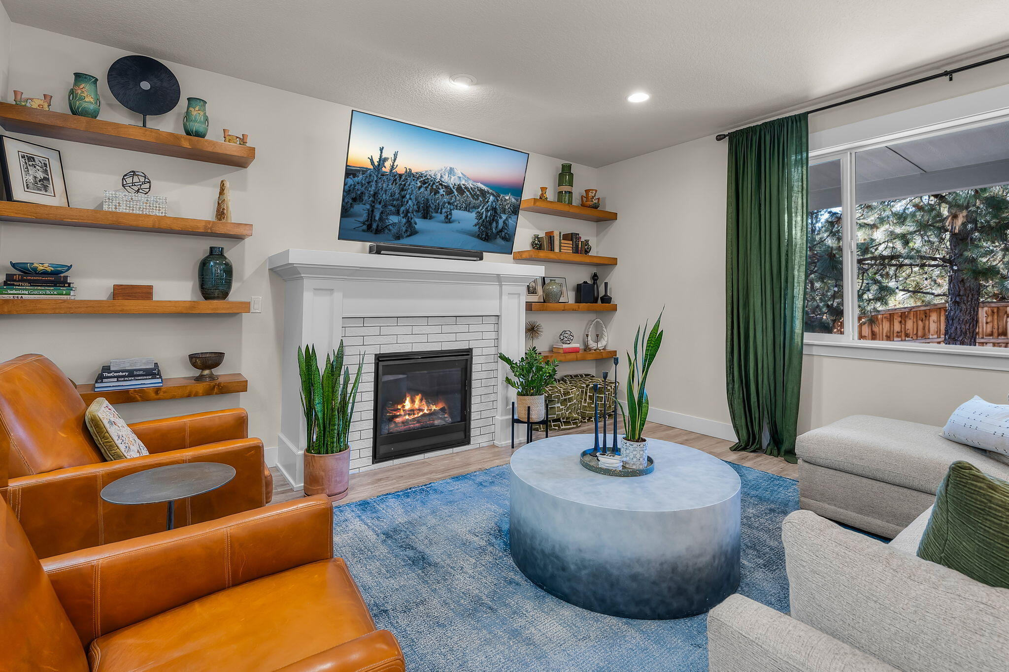 19985 Voltera Place Bend, OR 97702 - Photo 10 of 52 Custom floating shelves surround fireplace