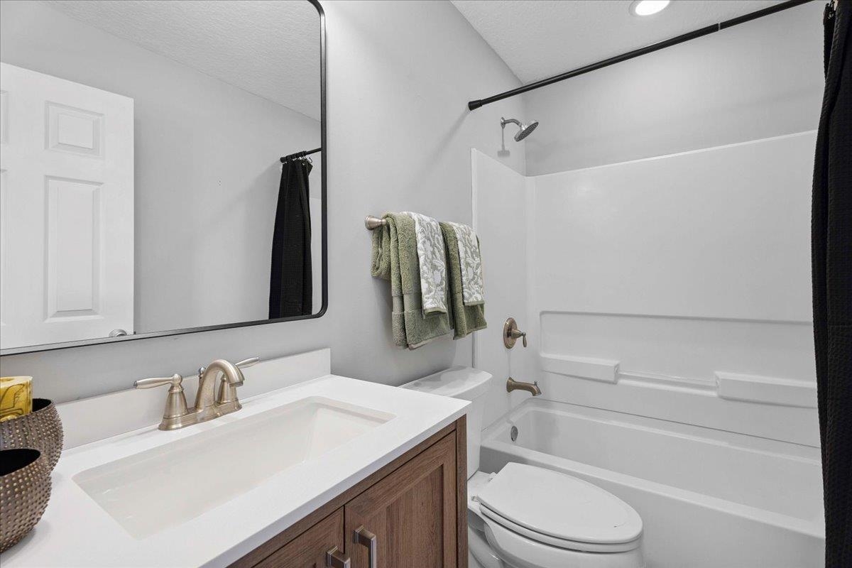 171 Islander Drive St. Augustine, FL 32080 - Photo 24 of 36 a bathroom with a sink toilet and shower