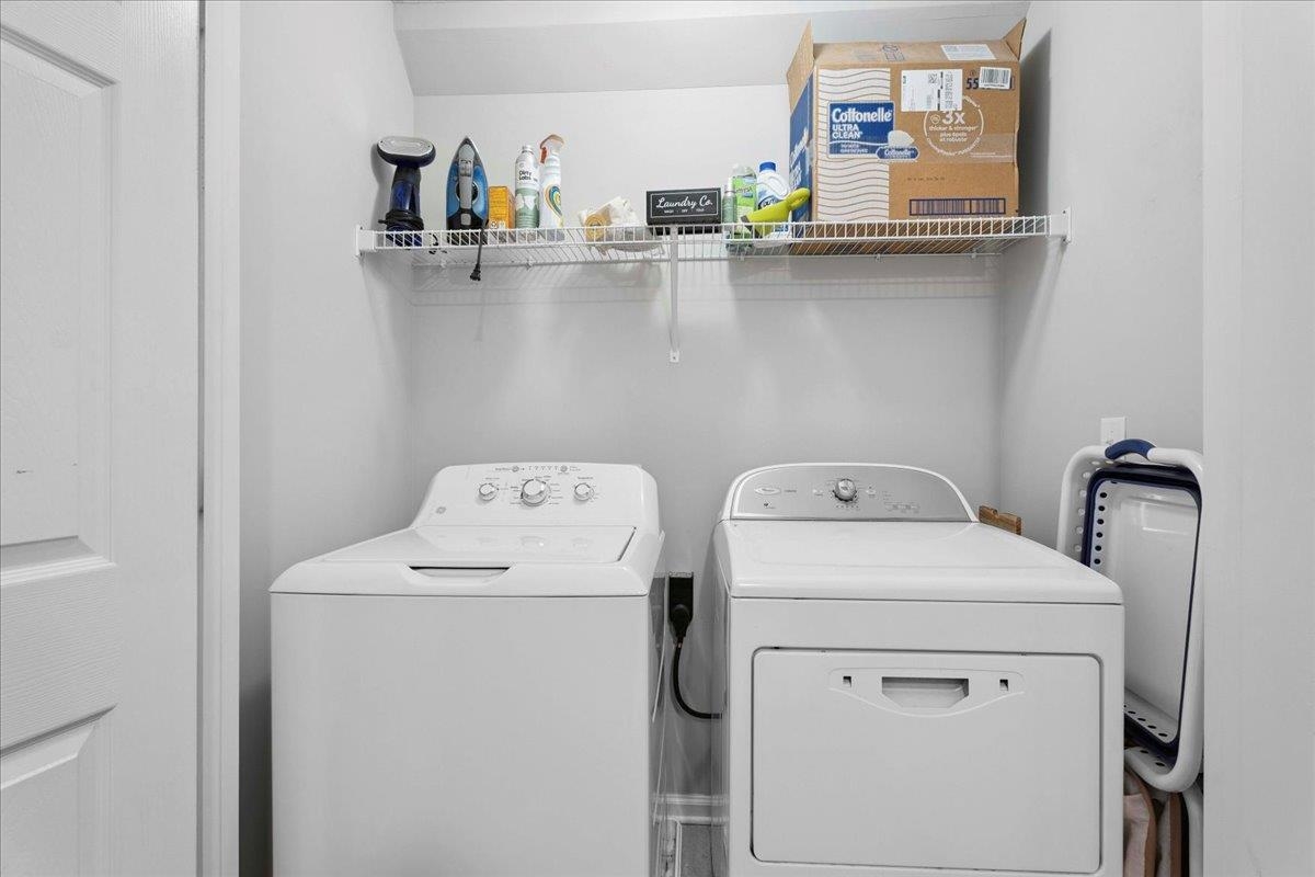 171 Islander Drive St. Augustine, FL 32080 - Photo 25 of 36 a utility room with dryer and washer