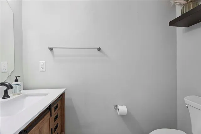 a bathroom with a sink and a toilet