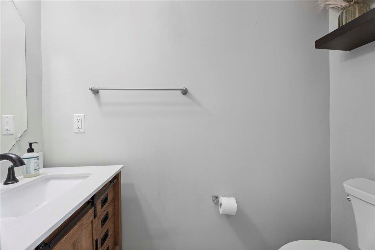 171 Islander Drive St. Augustine, FL 32080 - Photo 26 of 36 a bathroom with a sink and a toilet