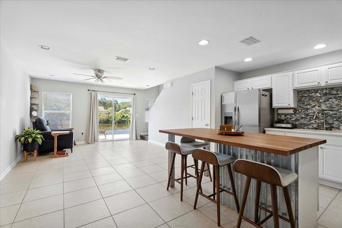 171 Islander Drive St. Augustine, FL 32080 - Photo 6 of 36 a view of a dining room with furniture