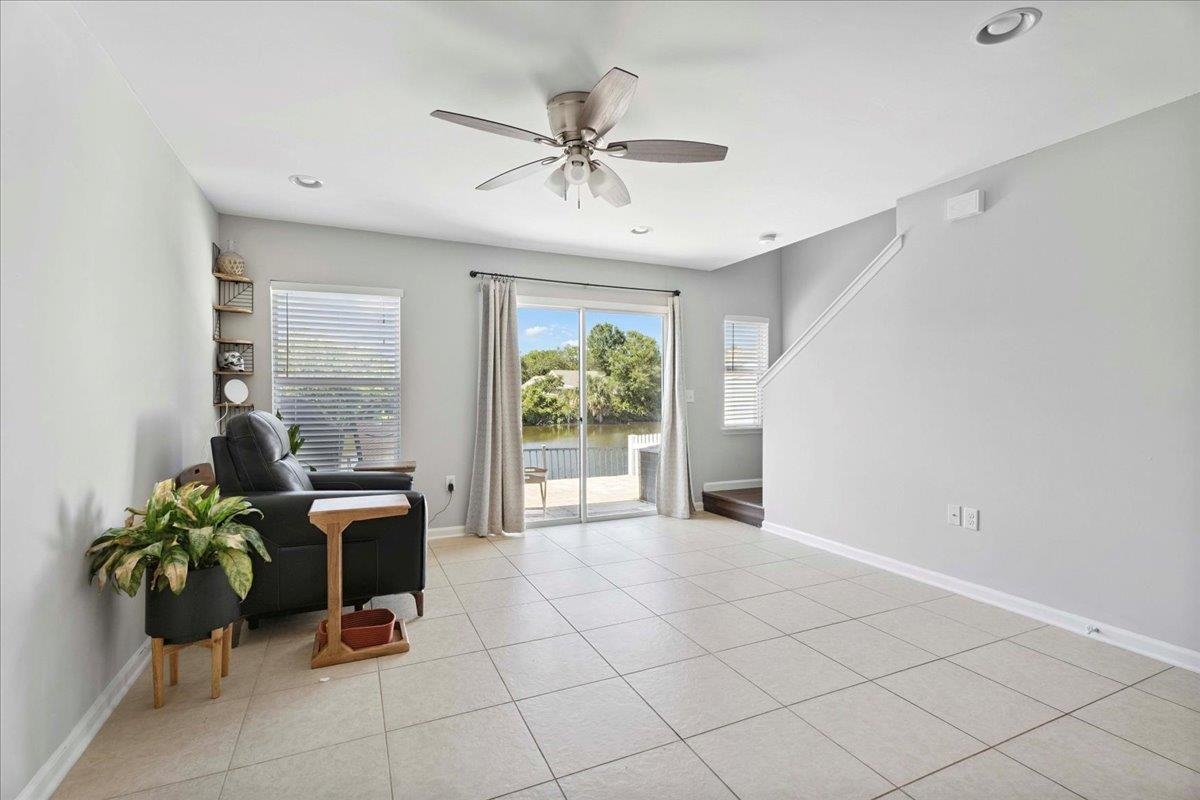 171 Islander Drive St. Augustine, FL 32080 - Photo 9 of 36 a view of a livingroom with furniture and a potted plant