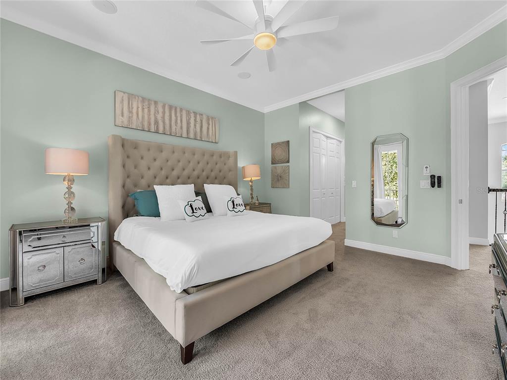 1231 Radiant Street Reunion, FL 34747 - Photo 26 of 26 a bedroom with a bed and a night stand