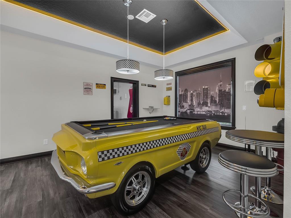 1231 Radiant Street Reunion, FL 34747 - Photo 6 of 26 a room with a table and a chair