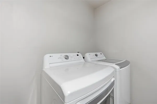 a kitchen with stainless steel appliances granite countertop a refrigerator sink and cabinets