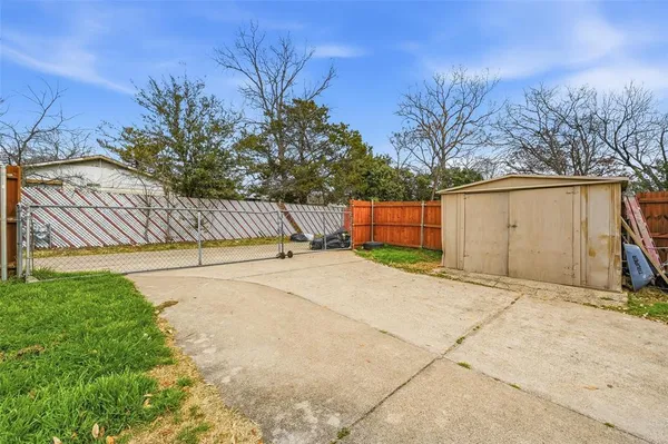 a car parked in front of a house