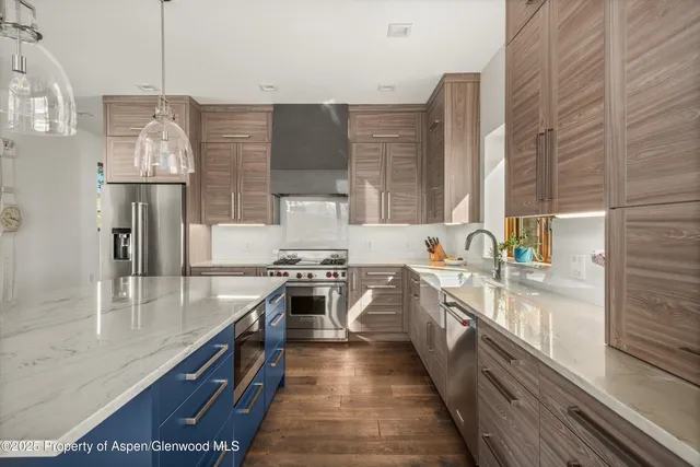 a view of a sink and wooden floor