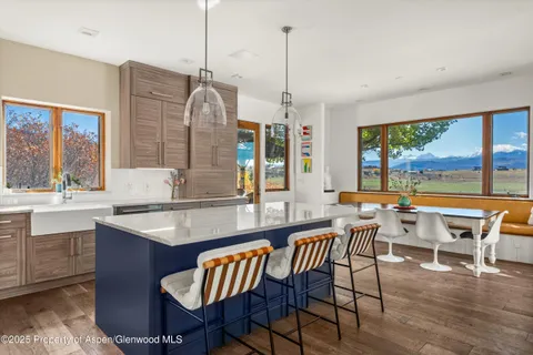 a bathroom with a shower and a sink
