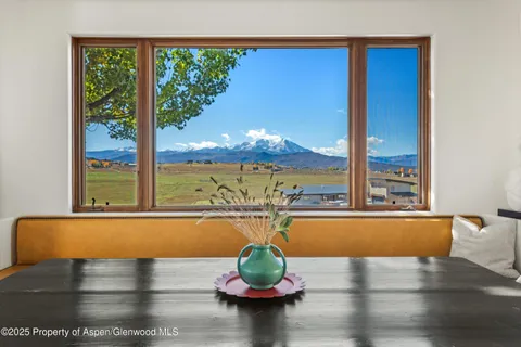 a view of swimming pool with seating space