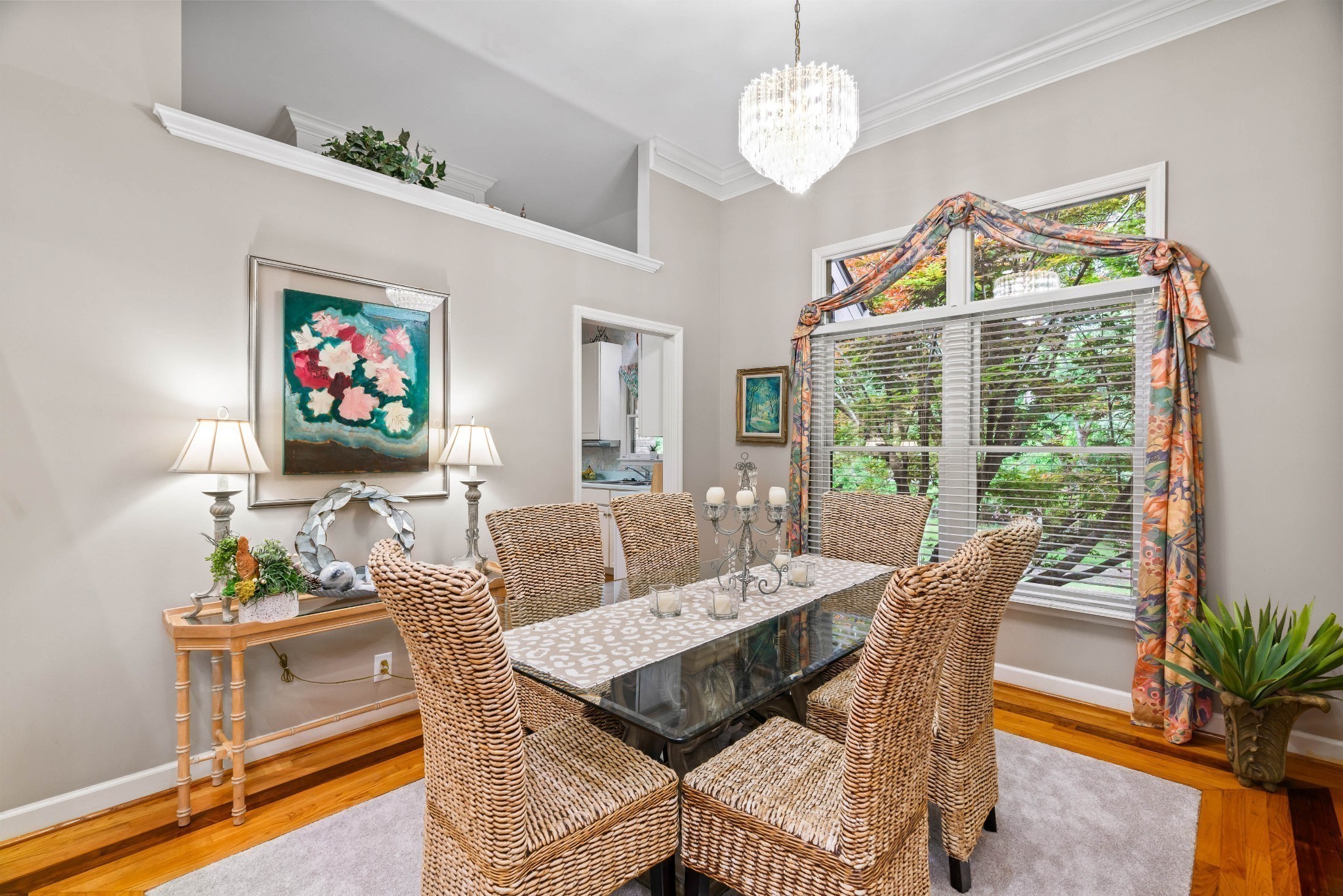 5544 South New Hope Road Hermitage, TN 37076 - Photo 13 of 62 a view of a dining room with furniture wooden floor and a chandelier