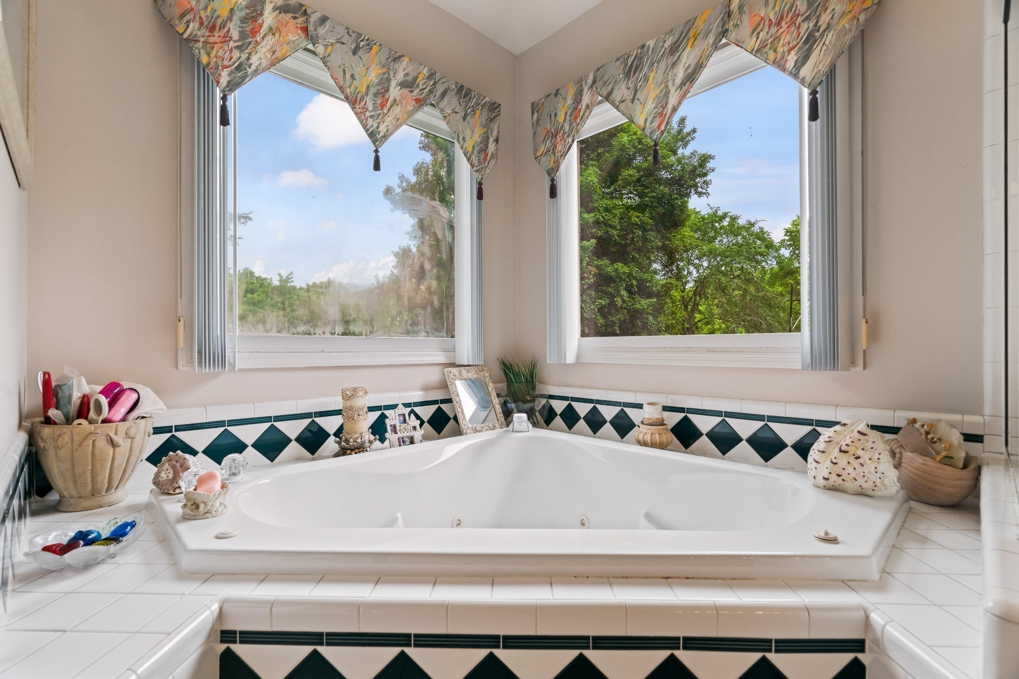 5544 South New Hope Road Hermitage, TN 37076 - Photo 18 of 62 a bathroom with a bathtub and a window