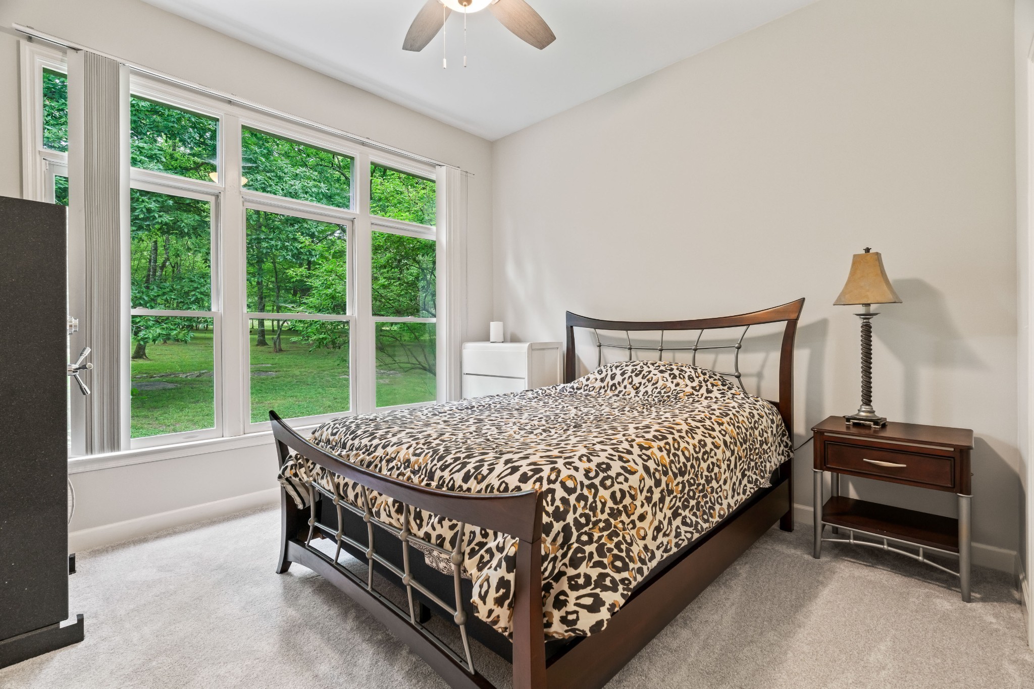 5544 South New Hope Road Hermitage, TN 37076 - Photo 21 of 62 a bed sitting in a bedroom next to a window