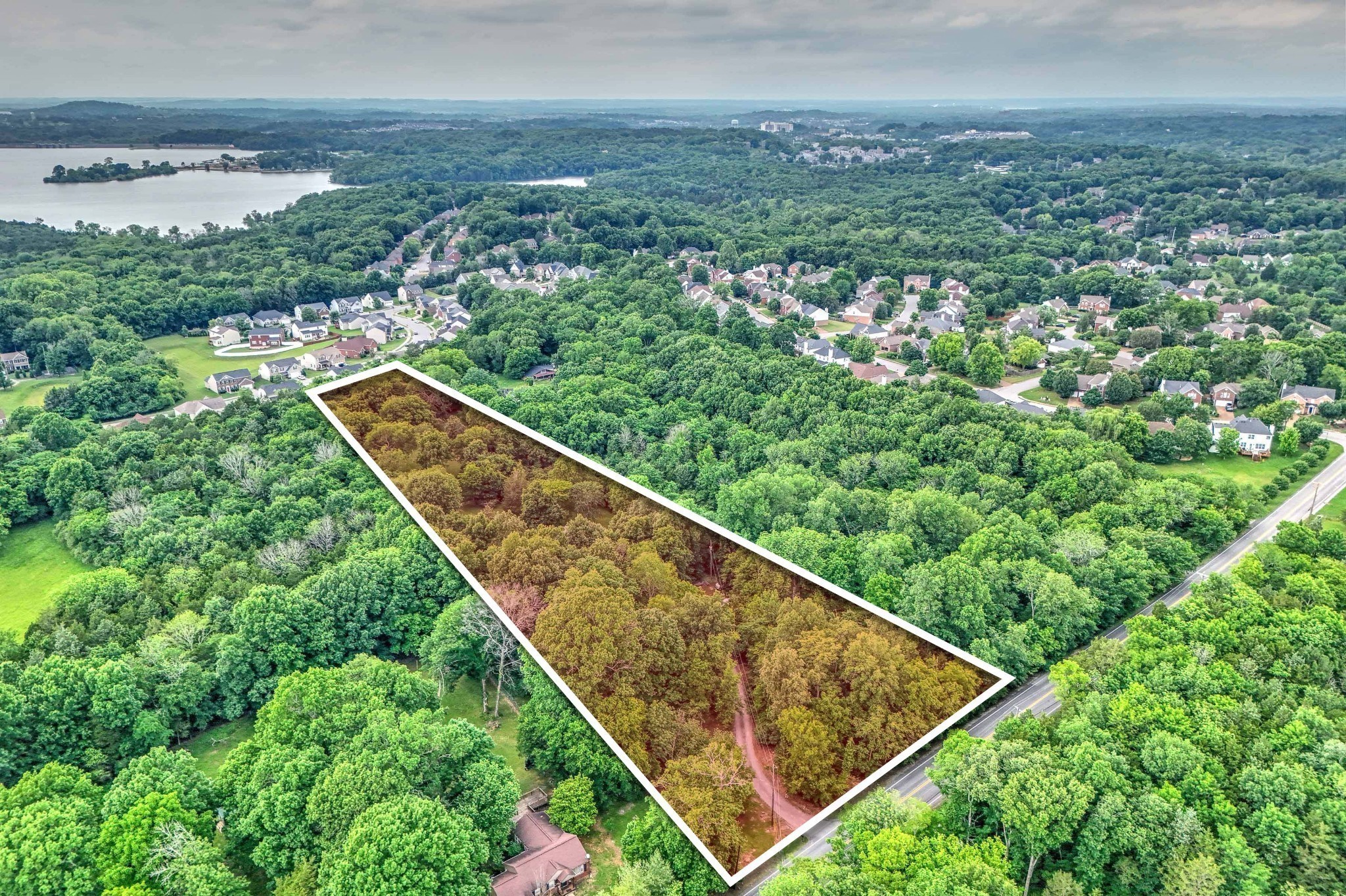 5544 South New Hope Road Hermitage, TN 37076 - Photo 28 of 62 an aerial view of residential houses with outdoor space and trees