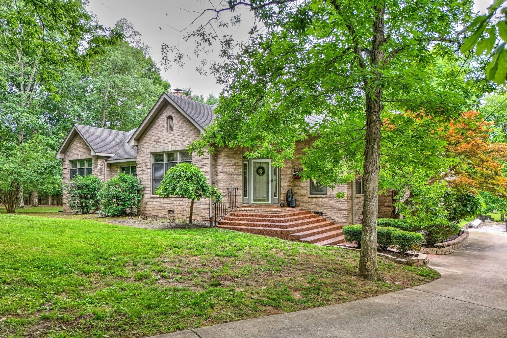 5544 South New Hope Road Hermitage, TN 37076 - Photo 29 of 62 a front view of a house with a yard