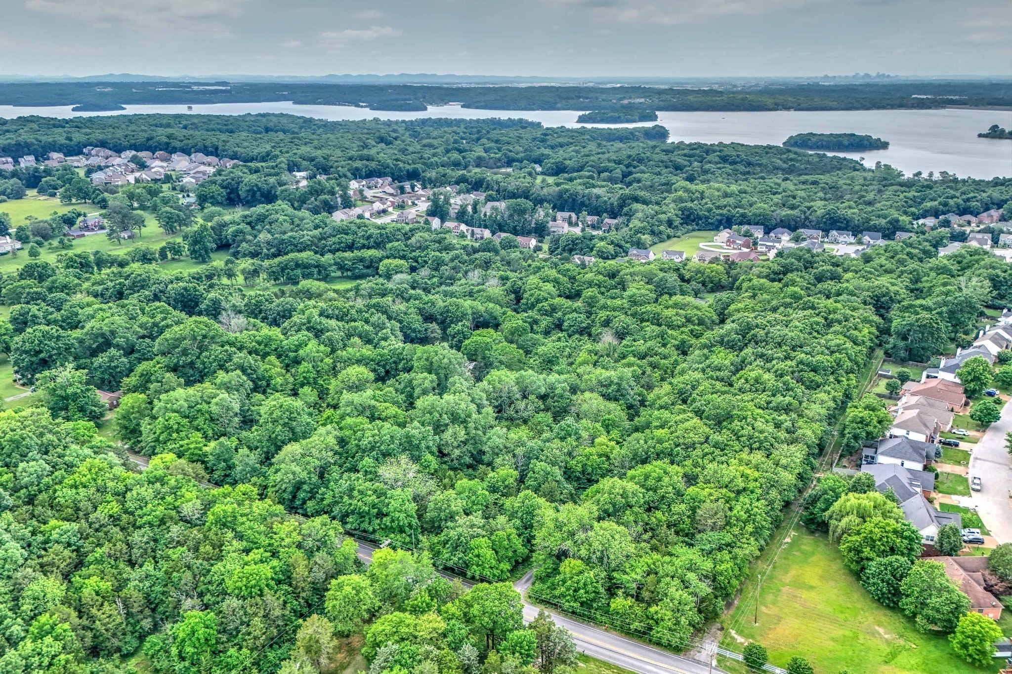 5544 South New Hope Road Hermitage, TN 37076 - Photo 35 of 62 an aerial view of residential house with outdoor space and trees all around