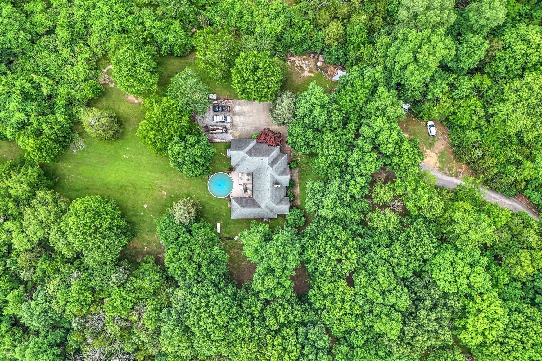 5544 South New Hope Road Hermitage, TN 37076 - Photo 36 of 62 an aerial view of a house with a yard and street view
