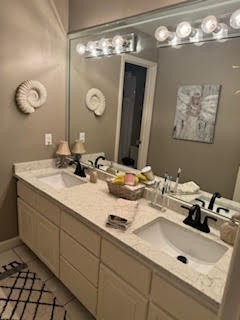 5544 South New Hope Road Hermitage, TN 37076 - Photo 55 of 62 a bathroom with a sink and a mirror