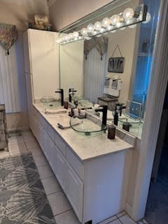 5544 South New Hope Road Hermitage, TN 37076 - Photo 58 of 62 a bathroom with a sink double vanity and a mirror