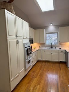 5544 South New Hope Road Hermitage, TN 37076 - Photo 59 of 62 a kitchen with stainless steel appliances a refrigerator sink and cabinets