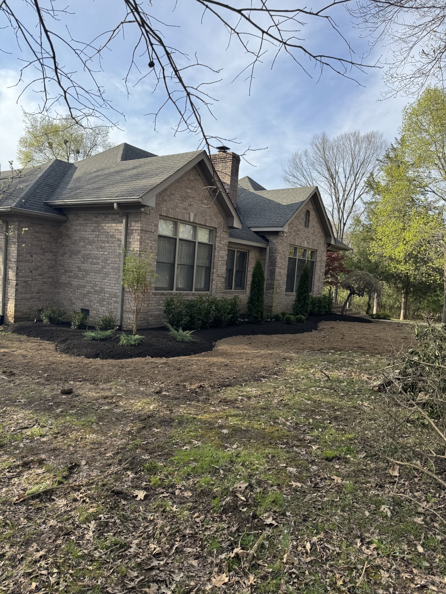 5544 South New Hope Road Hermitage, TN 37076 - Photo 60 of 62 a front view of a house with a garden