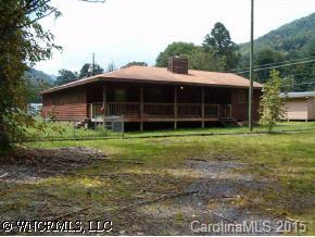 27 Ferndale Road Maggie Valley, NC 28751 - Photo 3 of 8 a view of a house with a yard