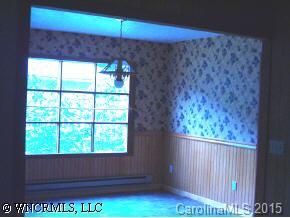 27 Ferndale Road Maggie Valley, NC 28751 - Photo 7 of 8 a view of a room that has a window and a chair