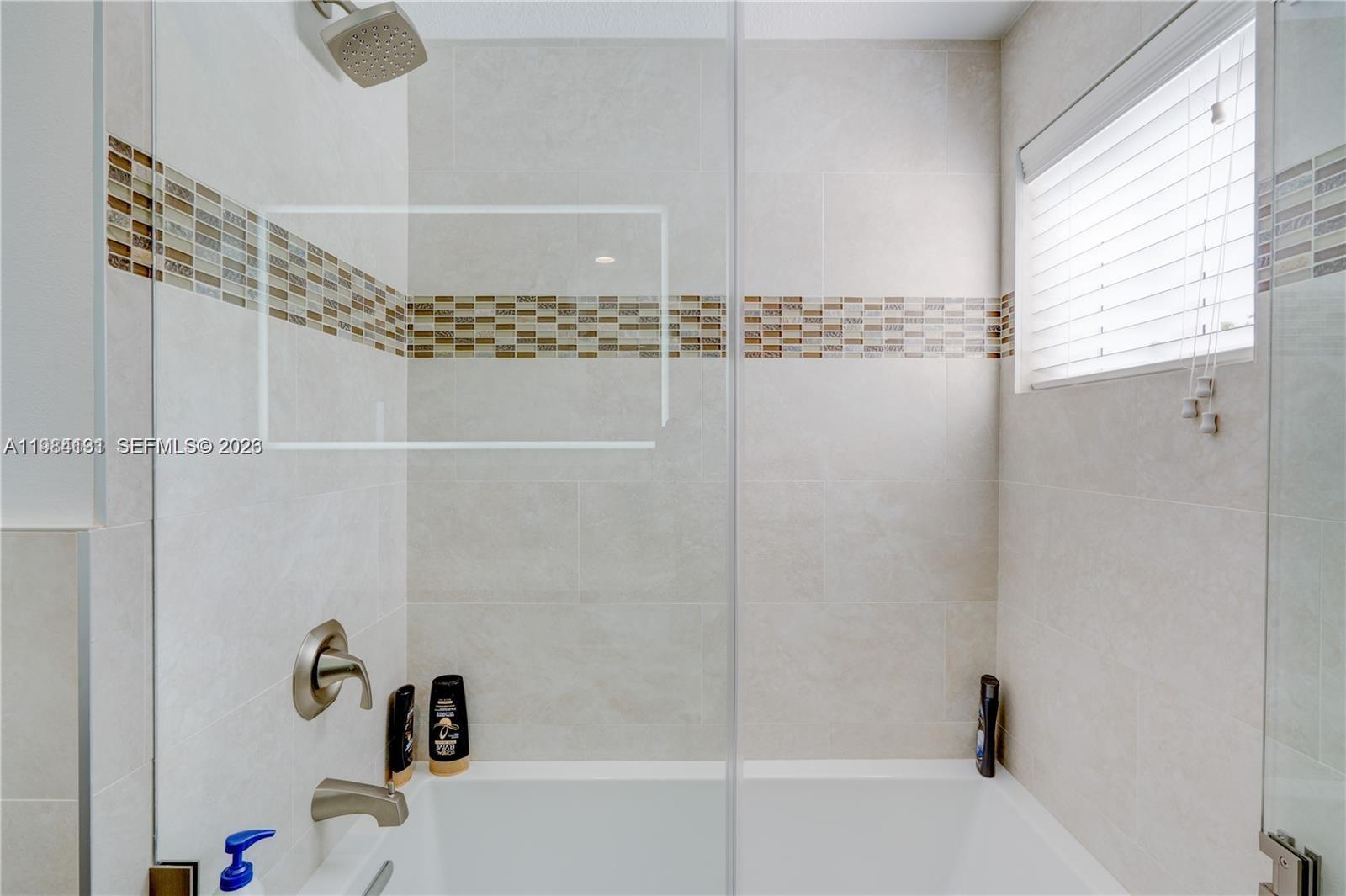 48 Andros Road Key Largo, FL 33037 - Photo 34 of 59 a bathroom with a shower