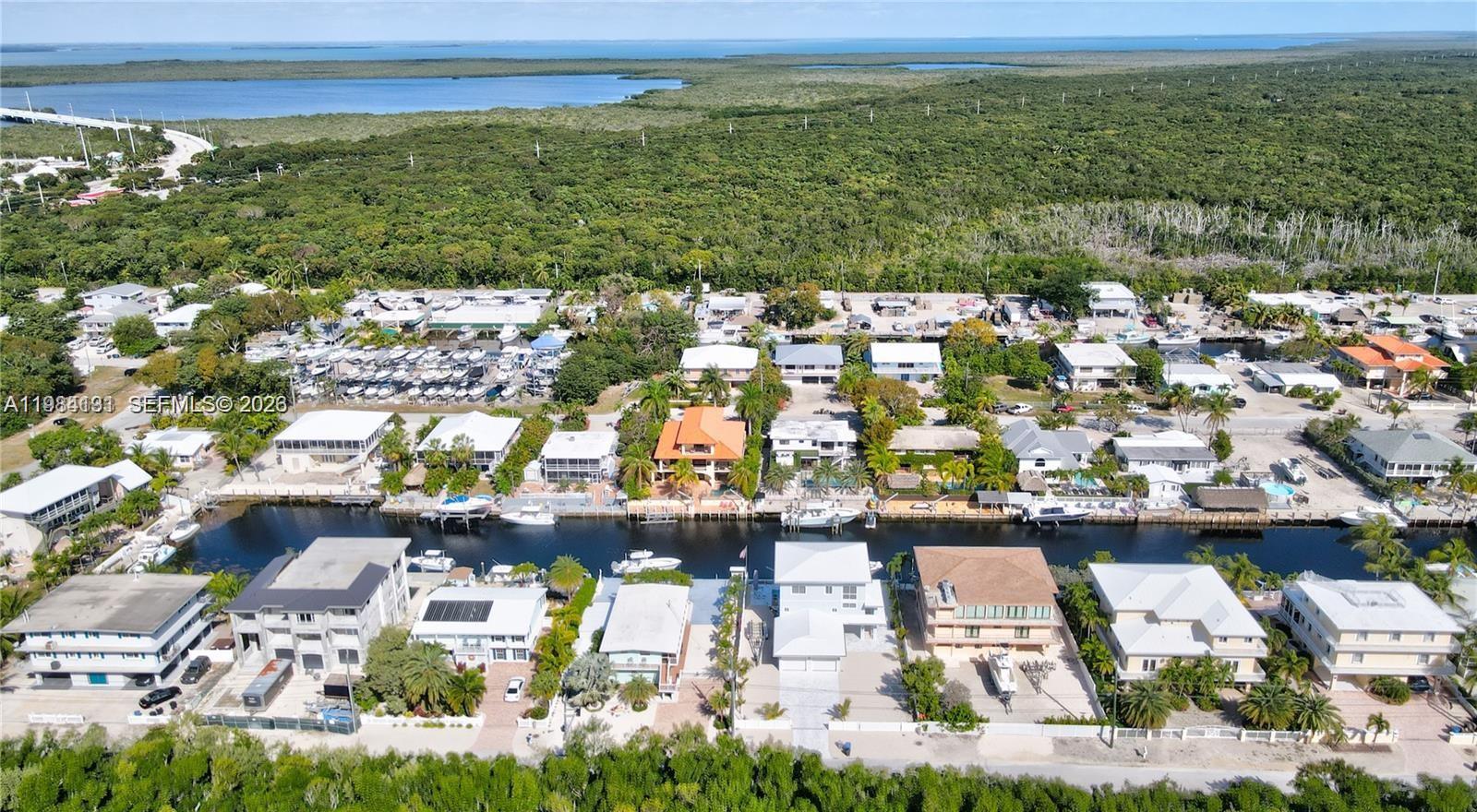 48 Andros Road Key Largo, FL 33037 - Photo 5 of 59 a view of a city with lots of trees