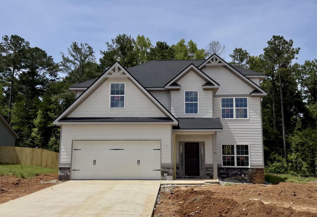 2376 Morrison Trace Opelika, AL 36804 - Photo 1 of 1 a front view of a house with a yard and garage